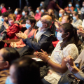 Participants enjoy the performance at the Tea House Theatre